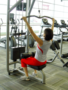 A Woman Working Out in the Gym