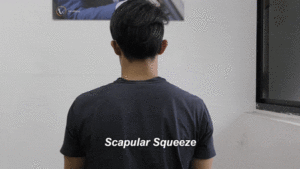 A Man Doing a Scapular Squeeze Moving Image